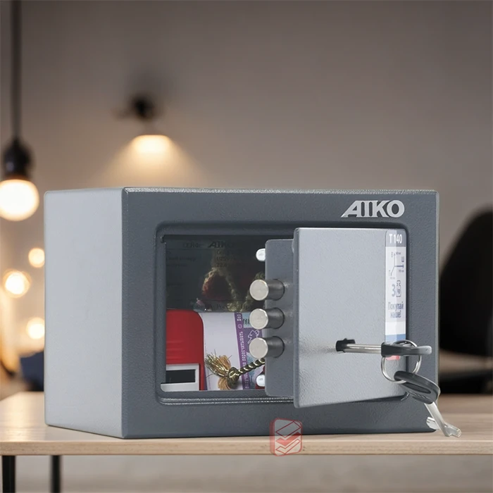 Маленький сейф для дома и офиса AIKO T-140 KL фото интерьер Стеллаж Мастер Маленький сейф для дома и офиса AIKO T-140 KL фото интерьер Стеллаж Мастер
